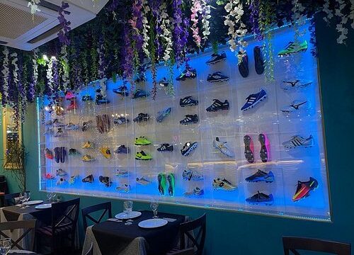 nuestra-pared-con-botas.jpg